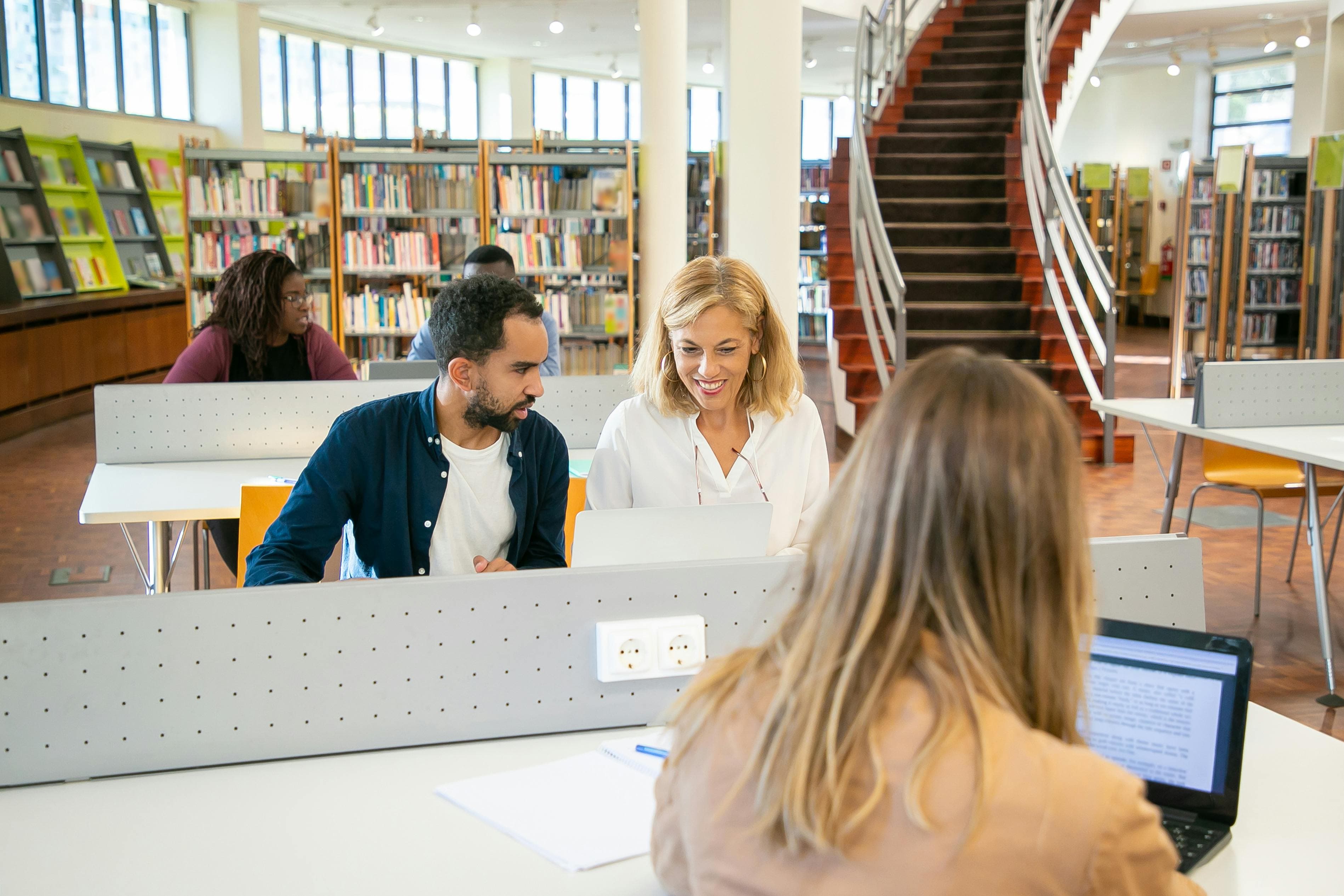 Students studying together in a university library — Kampus Production on Pexels